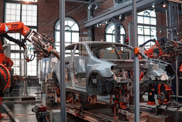 gray car on assembly line