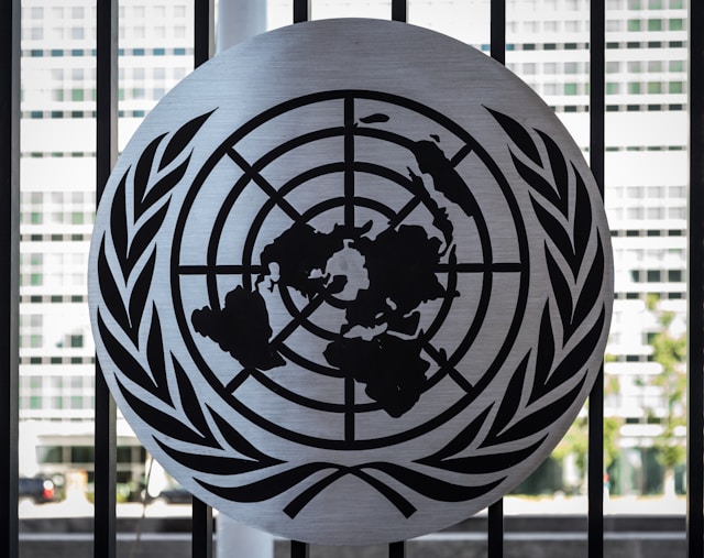 UN symbol over window