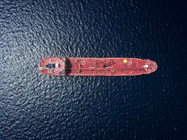 red tanker ship on the sea