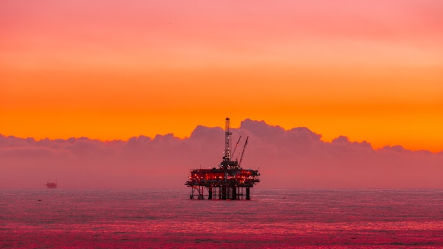 oil rig at sunset off California coast