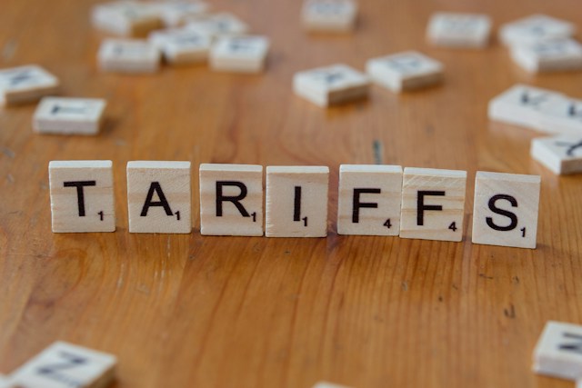 Scrabble play spelling out 'tariffs'