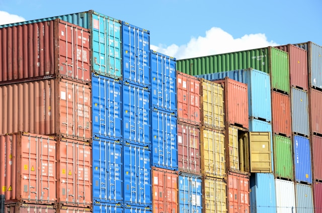 shipping containers stacked in port