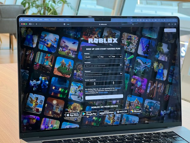 roblox website on laptop screen